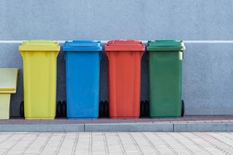 4 different colored recycling bins