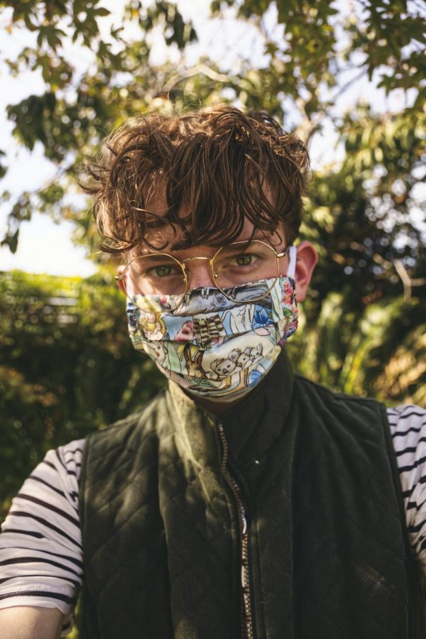 Teen boy with cloth mask