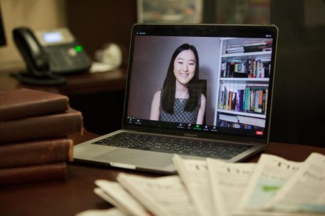 Photo of Su on computer screen