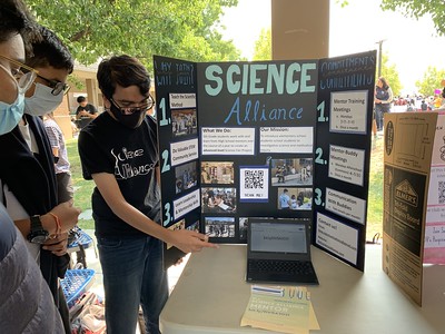 Anirudh Basu, senior and co–president of San Ramon High’s Science Alliance, introduces his club to potential members during in-person Club Day.