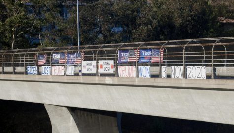 Protest signs on overpass