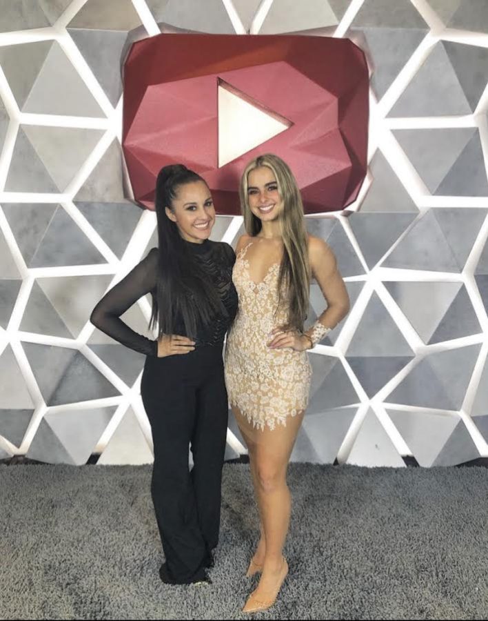 Former California High ASB President Ariadna Jacob, left, and TikTok star Addison Rae pose at the YouTube 2019 Streaming Awards. Jacob is suing The New York Times for defamation related to an article written about her TikTok talent management company.