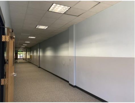 Originally, Northgate High School’s hallways such as this one leading to the Lecture Hall and classrooms had half-walls and separators.
