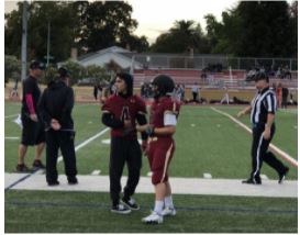 Northgate freshman Sadie Hansell, No. 2, talks with teammate David Franco, also a freshman, during the a game against Berean High in which Hansell made several tackles. Hansell plays defensive back, safety and corner.