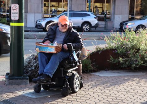Soapman Bill McGeehan offers a wide variety of homemade soaps for sale from his wheelchair at a Walnut Creek crossroads. 