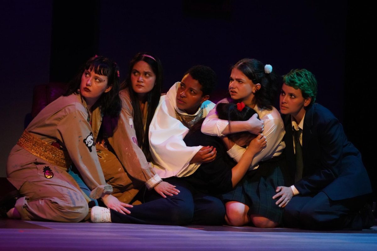 Cast members, from left, Natalie Farrell, Pamela Ignacio, Sarah Hadassah Negrón, Evelyn McCollum, Emma Simpson, and Ash Brown, in a scene from Antigone, presented by the girls of St. Catherines at the Lafayette Town Hall Theatre in May 2022. 