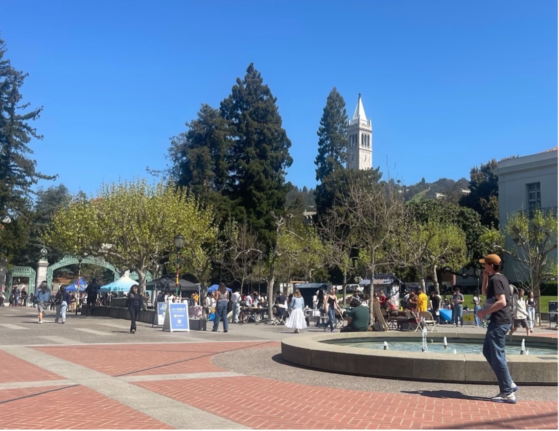 Students mingle on the campus at Cal Berkeley. In a 2023 report by the California Student Aid Commission (CSAC), 53% of students applying for financial aid were identified as being housing insecure and 66% were identified as being food insecure. 
