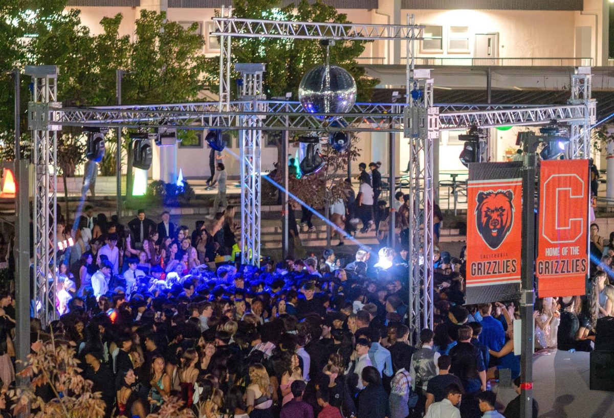 An assistant principal was attacked at the front of the school after she confronted a young person trying to leave the event early. The homecoming dance was held in the school quad. Photo by Alexander Gomes