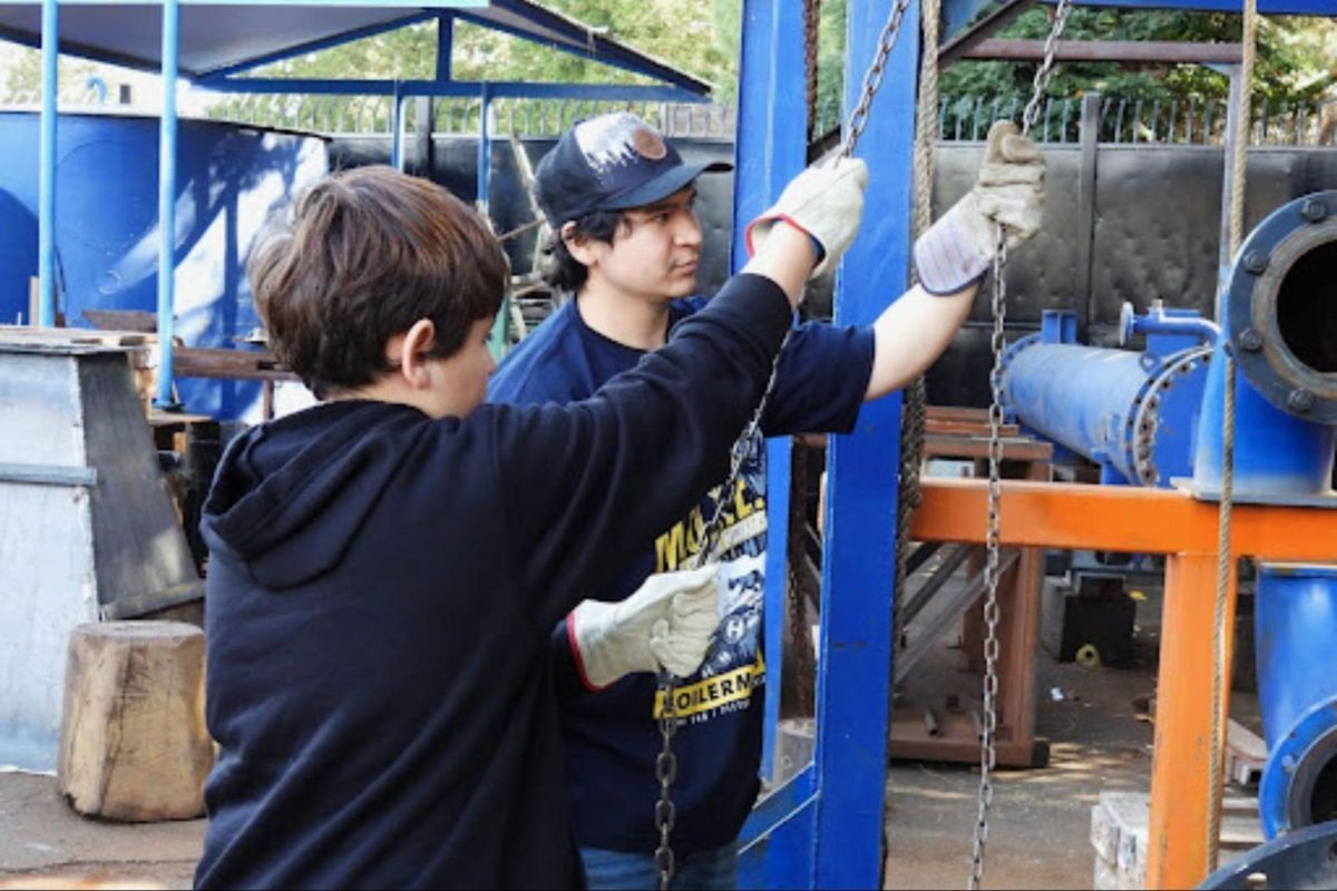Boilermakers Local 549 union’s training center offers on-the-job training in industrial welding, specialty welding, rigging, heavy-duty equipment operations, routine maintenance, and steelwork. A young visitor, left, at the training center in Pittsburg tries out some of the equipment during an apprenticeship class. Photo courtesy Cameron Zamora/Pittsburg Unified School District