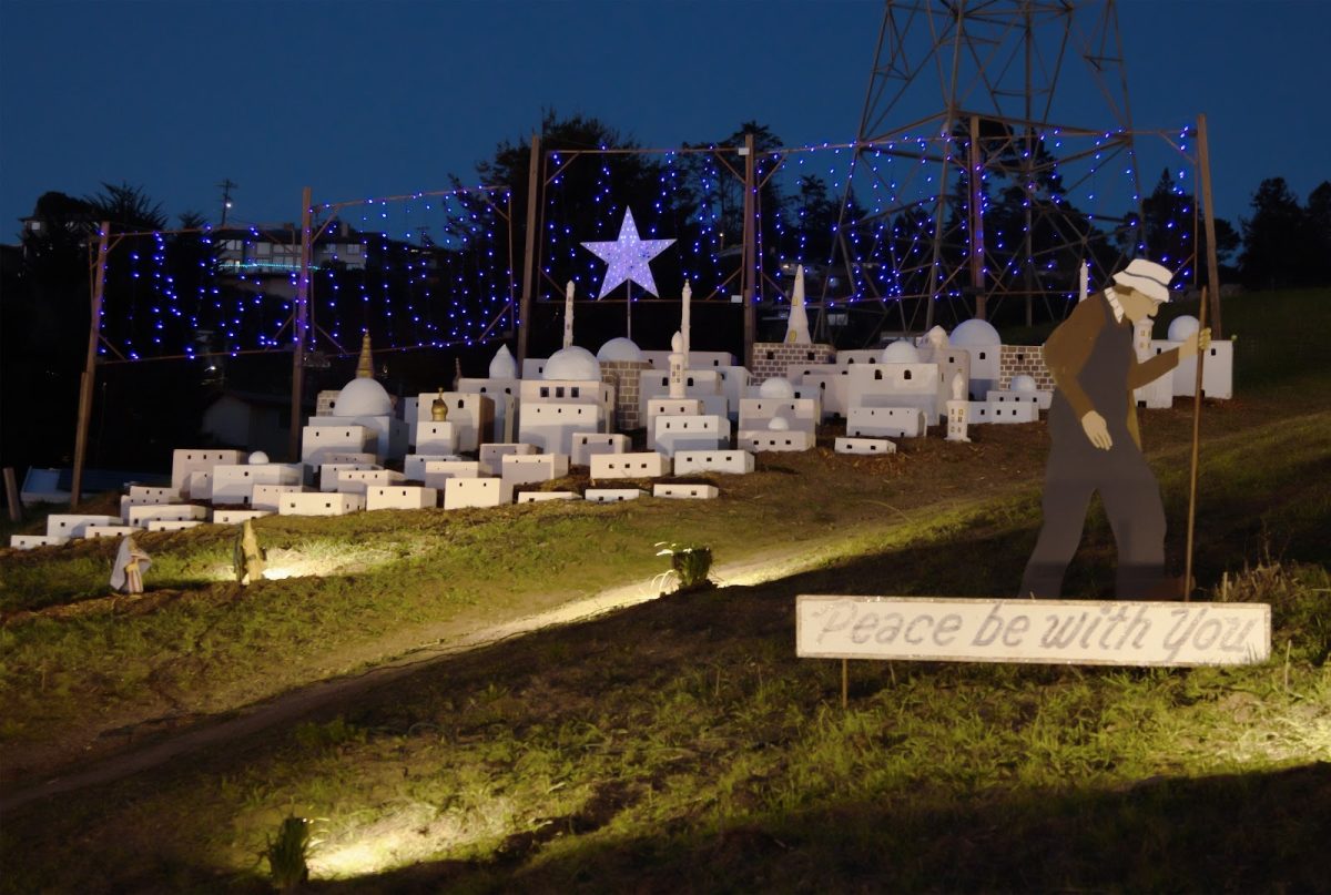 The Sundar Shadi Holiday Display in El Cerrito features a model of the city of Bethlehem, with lights representing the stars. The large blue star was the first display piece to be made and put up by Shadi on his property 76 years ago. 