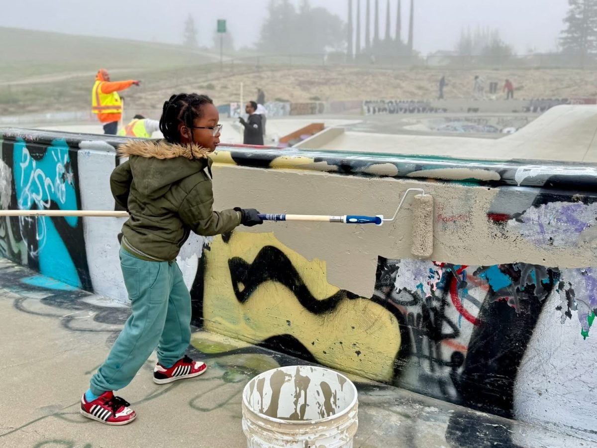 Frederick Young, a student from Belshaw Elementary School in Antioch, helps paint and restore the Antioch Skatepark during the MLK Day of Service on Jan. 19. (Photo courtesy of AUSD/Trine Gallegos)
