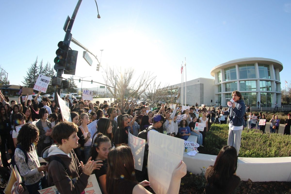 California High School 12th grader Benjamin Barba-Zuniga speaks to a crowd of students rallying against the U.S. Immigration and Customs Enforcement in front of the San Ramon City Hall on Feb. 6, 2026. (Photo by Ethan Miyasaki)
