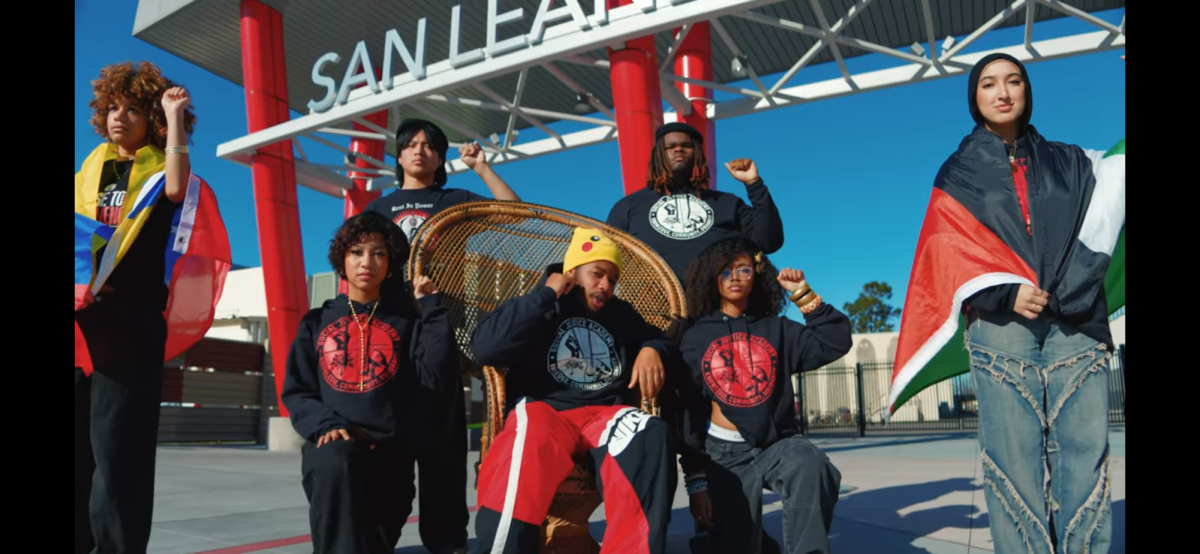 LaRussell, center, is surrounded by students from San Leandro High School in his “I’m From The Bay” visualizer, filmed on Jan. 16. (Photo courtesy of Good Compenny)
