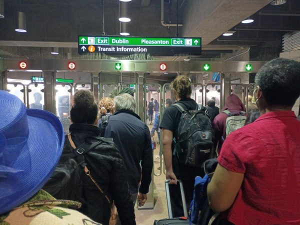 Passengers use their Clipper cards to pay BART train fares as they exit the Dublin/Pleasanton Station. Daily commutes could be affected if SB 63 fails and the 30% fare increase is implemented. 