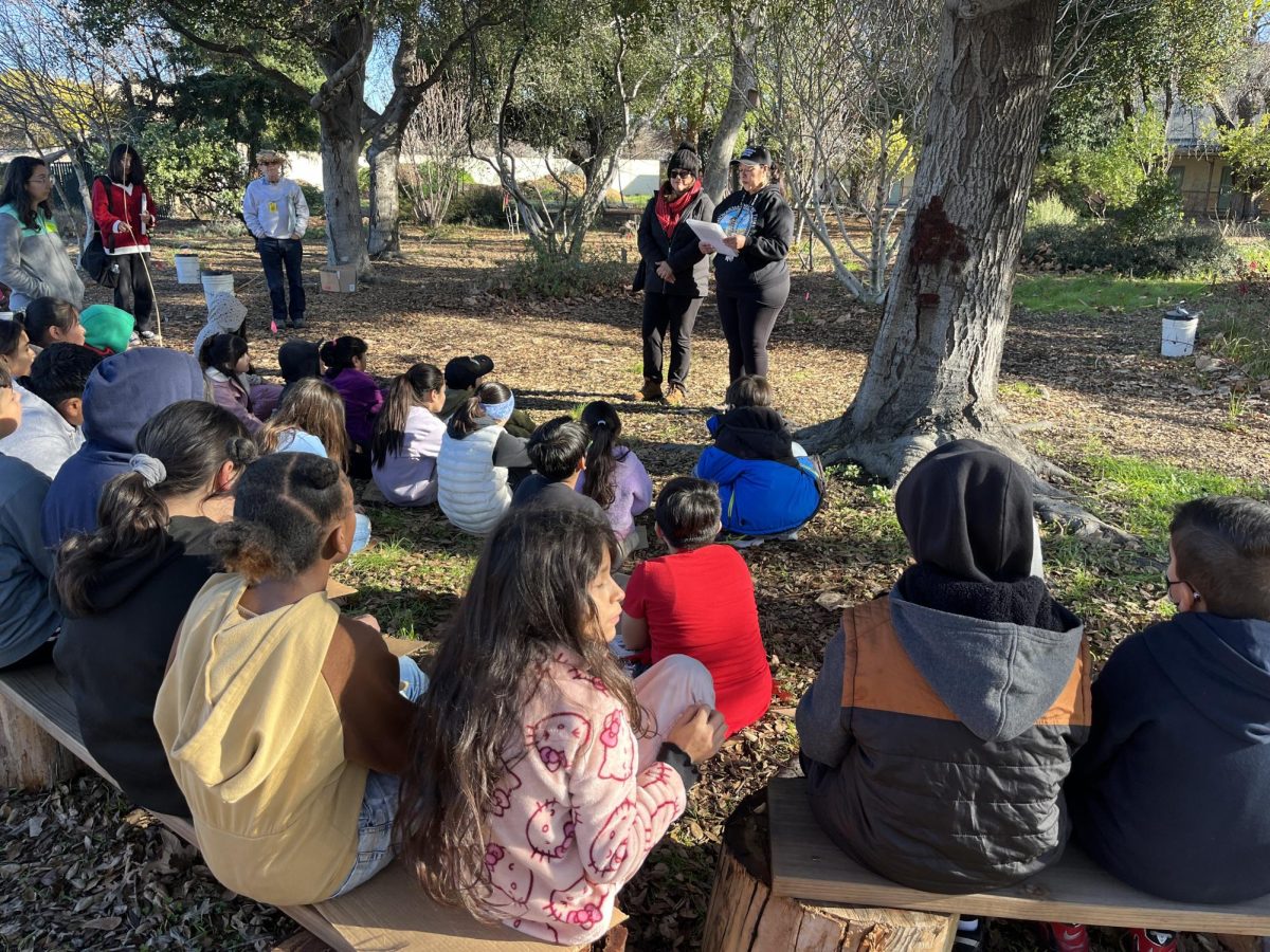 Elementary school students listen to a presentation by members of Growing Together. (Photo courtesy of Growing Together)
